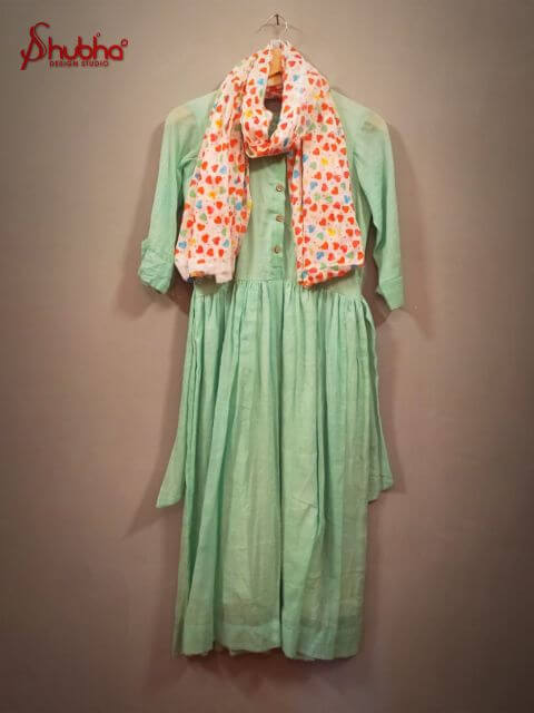 Doll dress with complementary multicoloured heart scarf